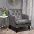 Fauteuil club capitonné en tissu gris ardoise