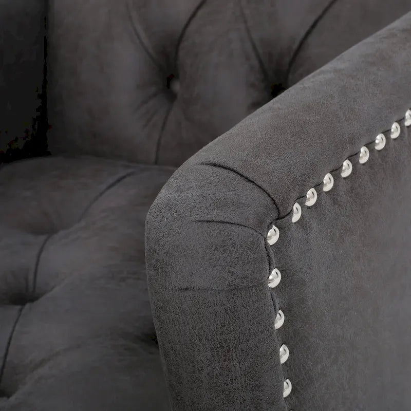 Fauteuil club capitonné en tissu gris ardoise